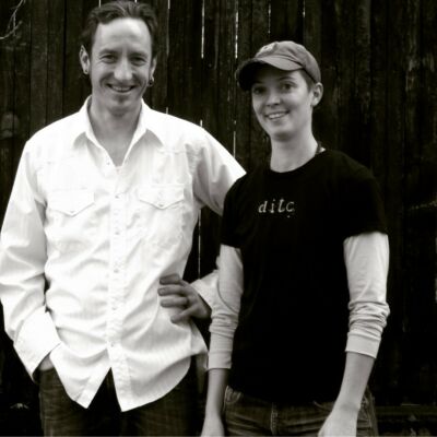 Gary and Amy standing together outdoors, black and white