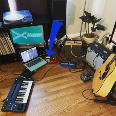Amy's home studio: keyboard, guitar and laptop
