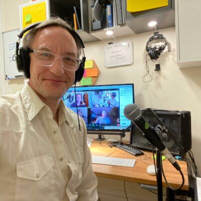 Gary in headphones at his desk